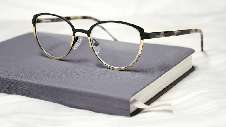 glasses on a journal