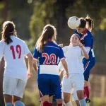 girl with sports injury headache